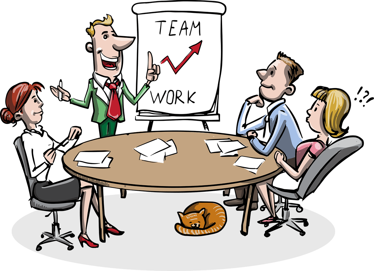 An illustration of a team sitting around a round table listening to a presenter. A few pages lie in front of each member. A board saying *growth with teamwork* is placed next to the presenter. A cat is resting right under the meeting table.